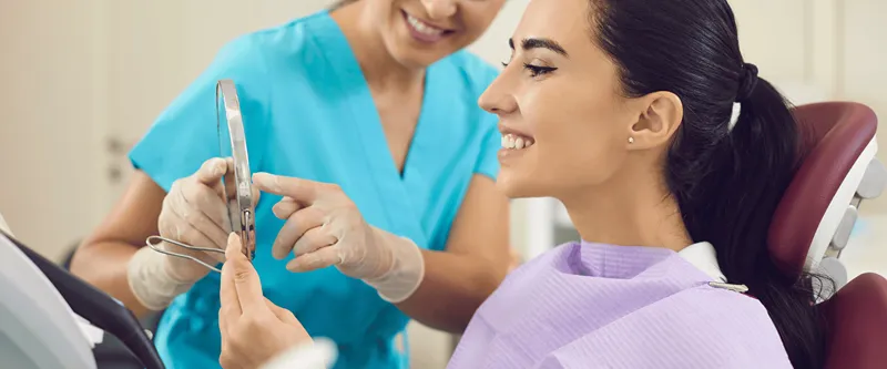 a patient smiling at her new smile